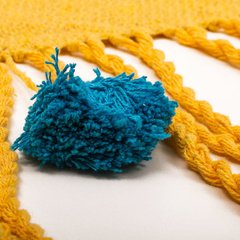 Manta pompom amarela Madri na internet