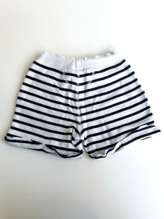Short Akiabara blanco con rayas negras y botones adelante Talle 6 años