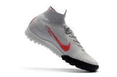 CHUTEIRA NIKE MERCURIAL SUPERFLY 6 ELITE TF RAISED ON CONCRETE VERMELHO E CINZA - comprar online
