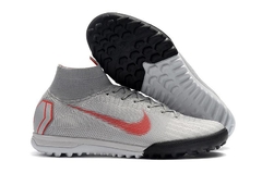 CHUTEIRA NIKE MERCURIAL SUPERFLY 6 ELITE TF RAISED ON CONCRETE VERMELHO E CINZA