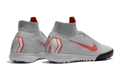 CHUTEIRA NIKE MERCURIAL SUPERFLY 6 ELITE TF RAISED ON CONCRETE VERMELHO E CINZA na internet