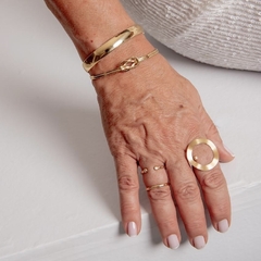 ANEL CIRCULO COM PONTO DE DIAMANTE OURO 18K na internet