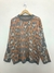 Imagen de FRIDA10 - SWEATER OVER ANIMAL PRINT Y FLORES