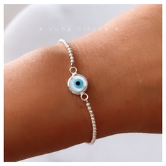 Pulse bolitas de plata y ojo en nácar - comprar online