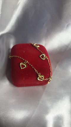 Pulseira com corações vazado - loja online