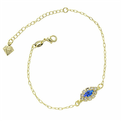 Pulseira banhado a ouro com adereço contendo navete acrílco rodeado por zirconia