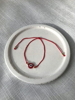pulsera hilo rojo y ojo