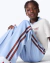CALÇA INFANTIL WIDE LEG COM LISTRAS LATERAIS MARROM E AZUL - loja online