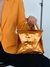 Cartera Adore naranja metalizado en internet