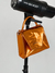 Cartera Adore naranja metalizado