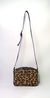 Bandolera Courtney animal print símil pelo