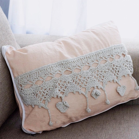 Almohadón guarda tejida a mano