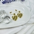 Aros dorados corazón con detalles colgante