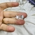 Anillo acero blanco corazones con relieve