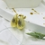 Aros gotas dorados rayas - comprar online