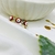 Anillo dorado 3 ojos rojo strass - comprar online