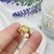 Anillo dorado círculos cruzados ajustable