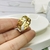 Anillo dorado ovalos entrelazados