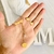 Conjunto dorado aros+ gargantilla corazones - comprar online