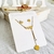 Conjunto dorado aros+ gargantilla corazones