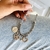 Pulsera cadenas multidijes corazones y árboles