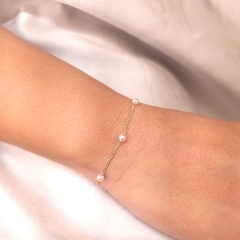 Pulseira Pérolas Espaçada 16cm+5cm banhado em ouro 18k