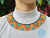 Collar Para Mujer en Mostacilla Checa Estilo Okama Embera Triangulos Multicolor Punta Dorada