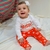 CONJUNTO DE BEBÊ COM BODY MANGA LONGA CALÇA SARUEL LARANJA BLESSED - comprar online