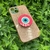 Capa com brilho + suporte olho grego iPhone 13 - loja online