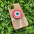 Capa com brilho + suporte olho grego iPhone 12/12 Pro - DannyCases