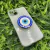 Capa com brilho + suporte olho grego iPhone 13 - comprar online