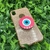 Capa com brilho + suporte olho grego iPhone XR - comprar online