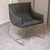 (TL) Sillón mecedor de acero y cuero gris de Duveen / 65x60x65