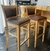 (MW) Mesa barra enchapada guatambu y 12 banquetas tapizadas en ecocuero / mesa 480x120x103- banquetas 42x41x78/106 en internet