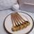 Cucharita para postre dorada con mango textura de madera x6 / BL235-CACJD263*6