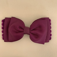 Laços com pompom
