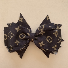 Laço estampado G na internet