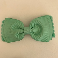 Laços com pompom na internet