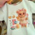 Conjunto Blusa Malha Tchibum E Short Moletinho Sublimado Kamylus na internet