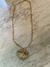 Collar con dije de corazón en internet