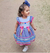 Vestido Marina Azul com chapéu de palha decorado na tiara - (cópia) - Atelier Lorena Tolentino