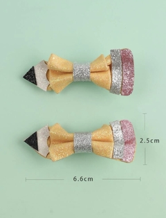 Moños lápices niñas en internet