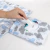 Trocador portátil plastificado - arco íris azul - Enxoval completo para seu bebê - Nanna Baby