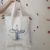Lienzo 35x35 con manijas + impresión - comprar online