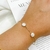 PULSEIRA DELICADA DE PEROLA FOLHEADA A OURO 739882