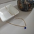 Colar ponto de luz banhado ouro