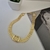 Choker trabalhada banhada ouro