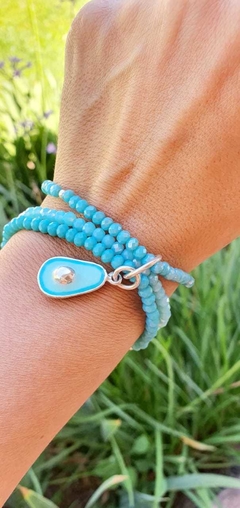 Imagen de Trío de pulseras cristal de roca con dije palta