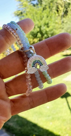 Trio pulsera cristal de roca con dije arcoiris