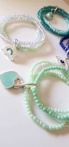 Trio pulsera cristal de roca con dije corazon doble en internet